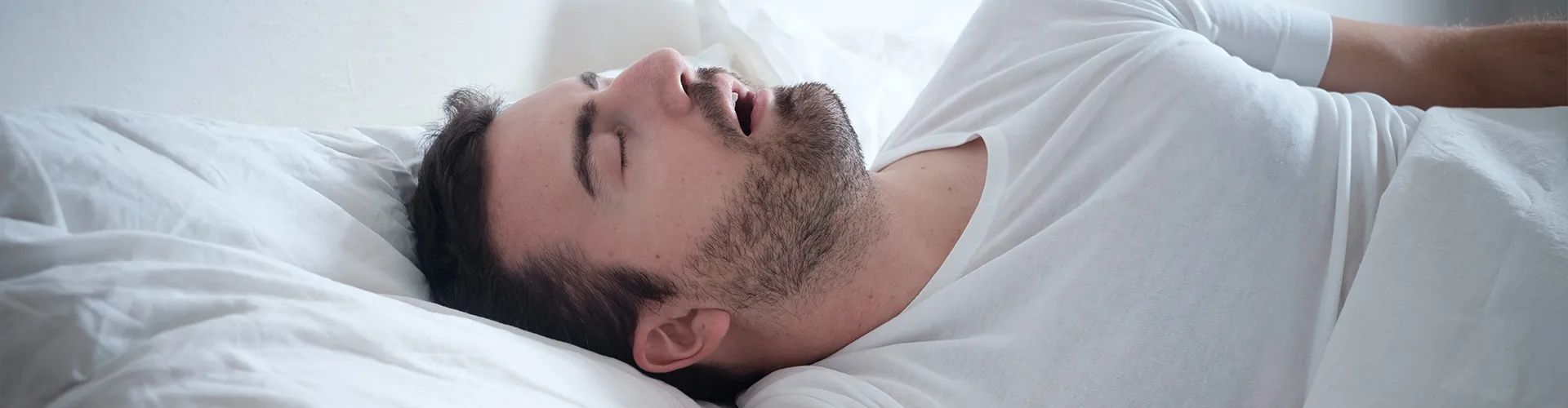 male asleep on his back