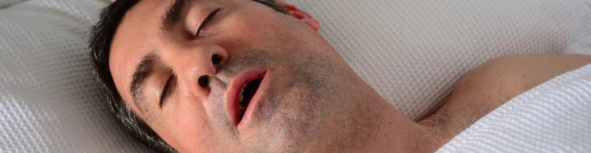 man sleeping with his mouth open