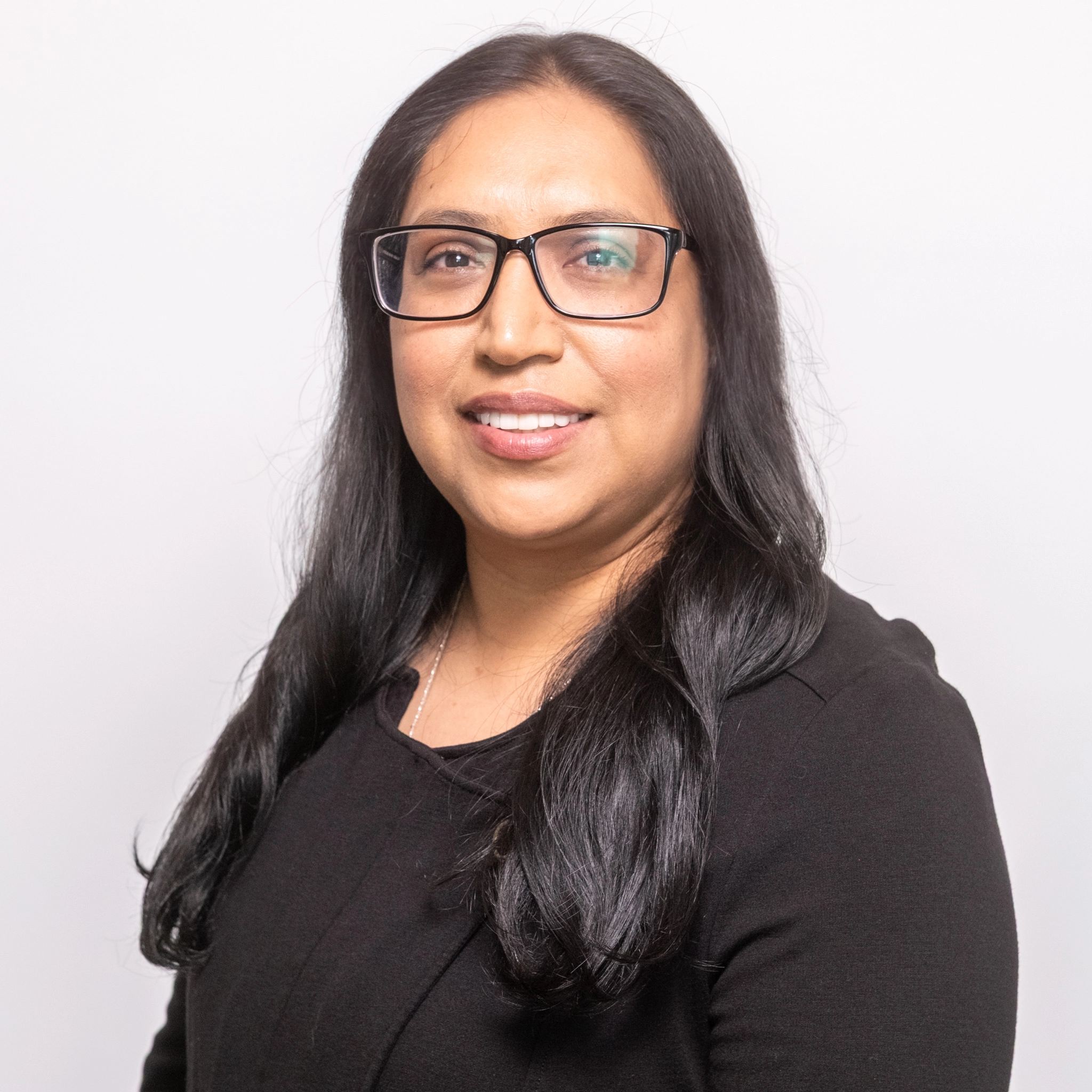 Coming soon message over blurred image of female professional.