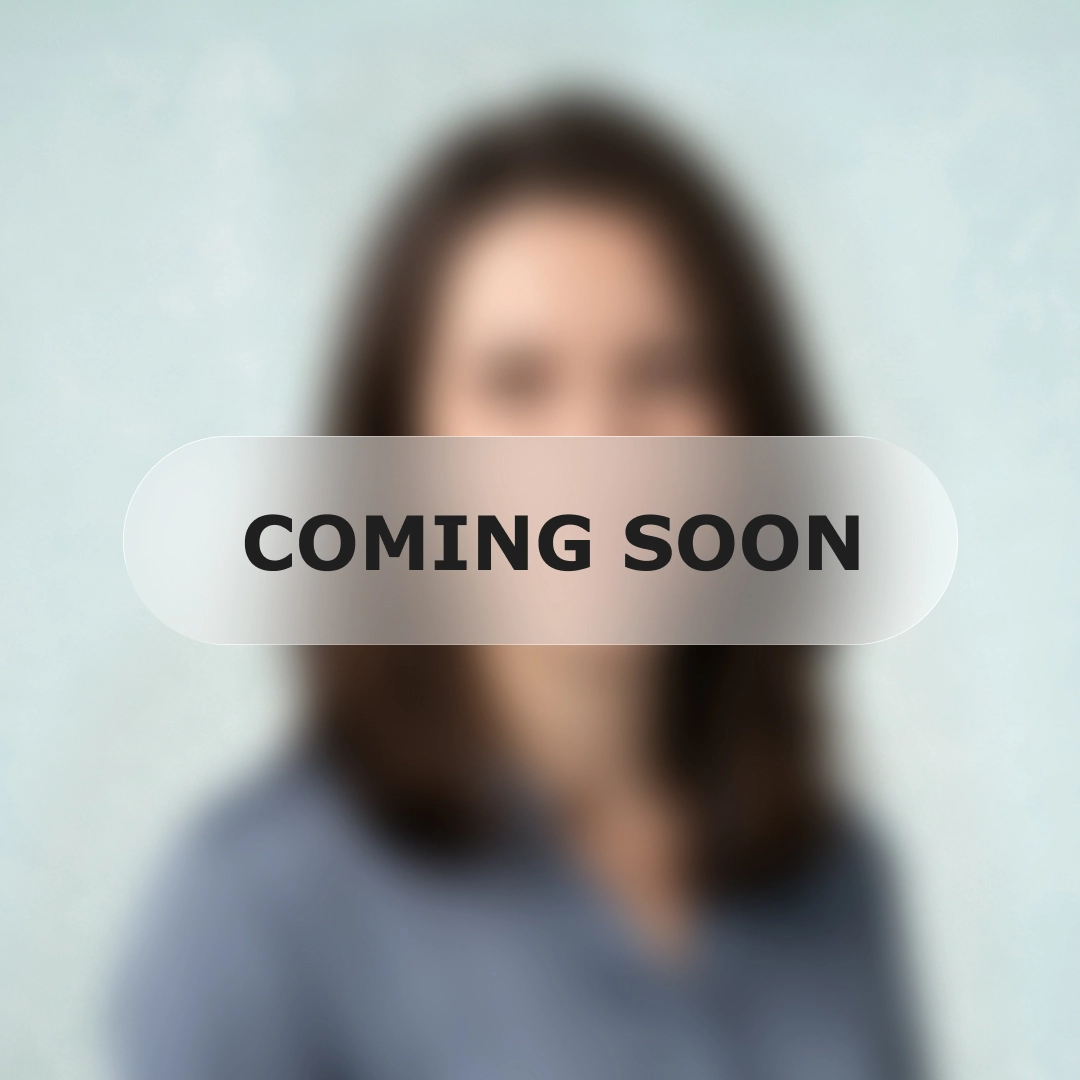 Coming soon message over blurred image of female professional.