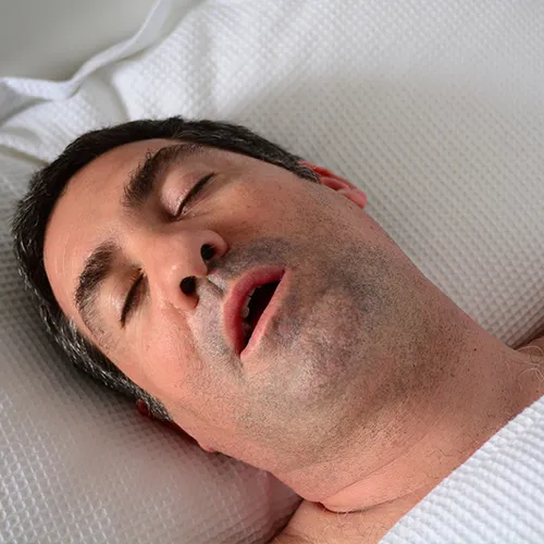 man sleeping with his mouth open
