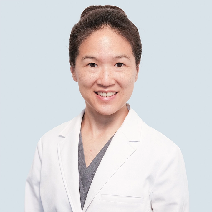 Professional photograph of Bill Harnold in lab coat in studio